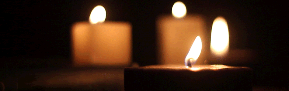 Lit candle invites your Catholic Prayer Request